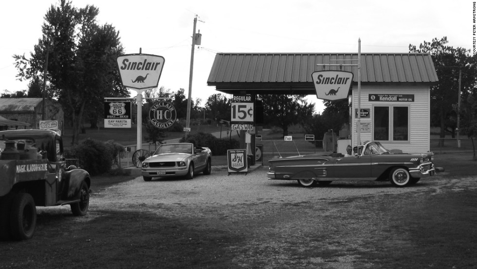 old cars at gas station